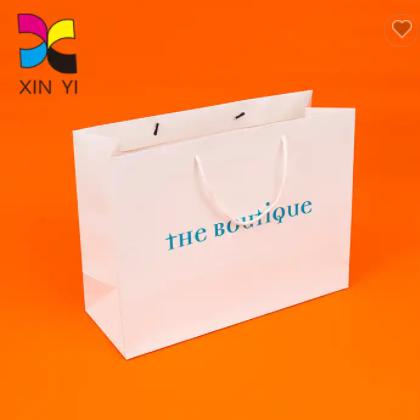 Guangzhou factory price custom decorative bags printing unique paper bag / 2